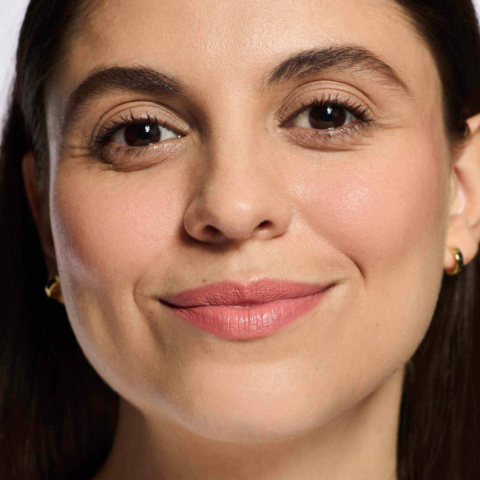 light medium skin model wearing pink 01 lipstick shade