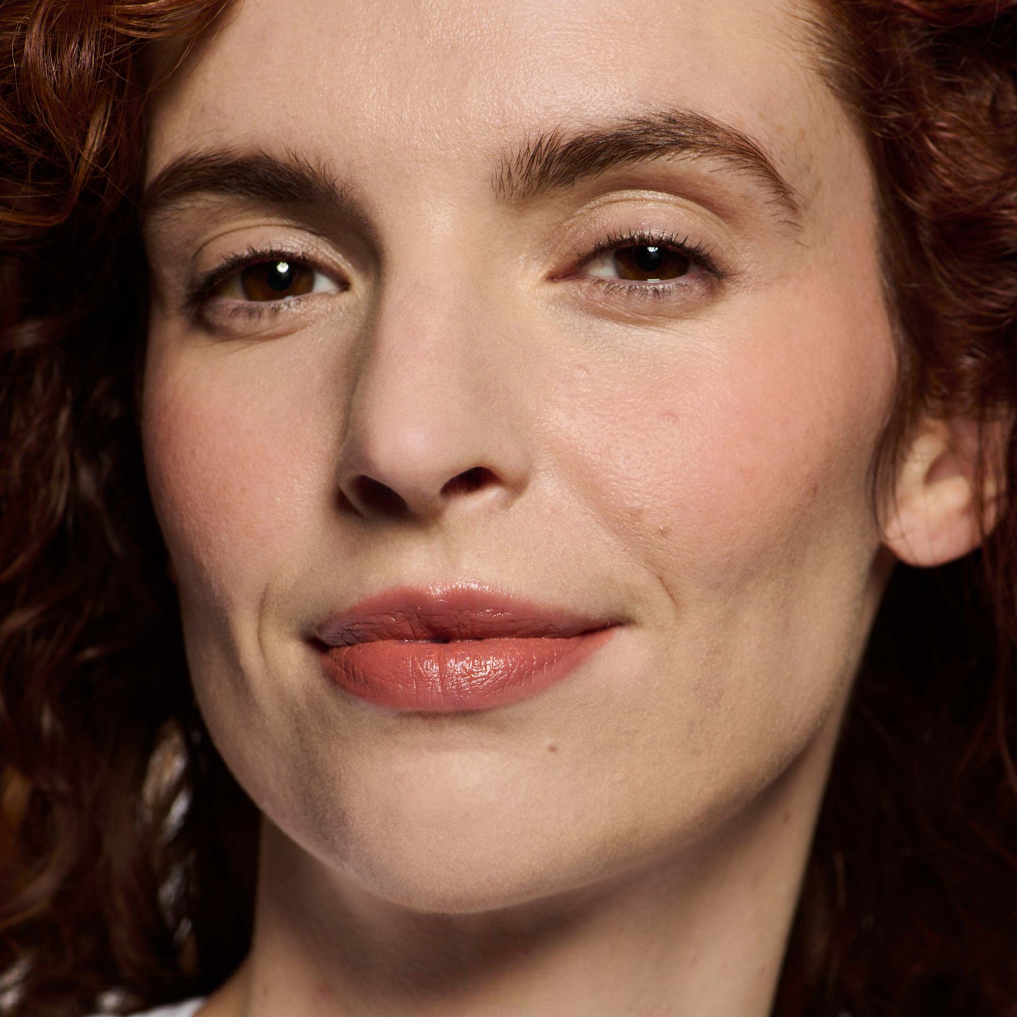 fair skin model wearing peach 02 lipstick shade