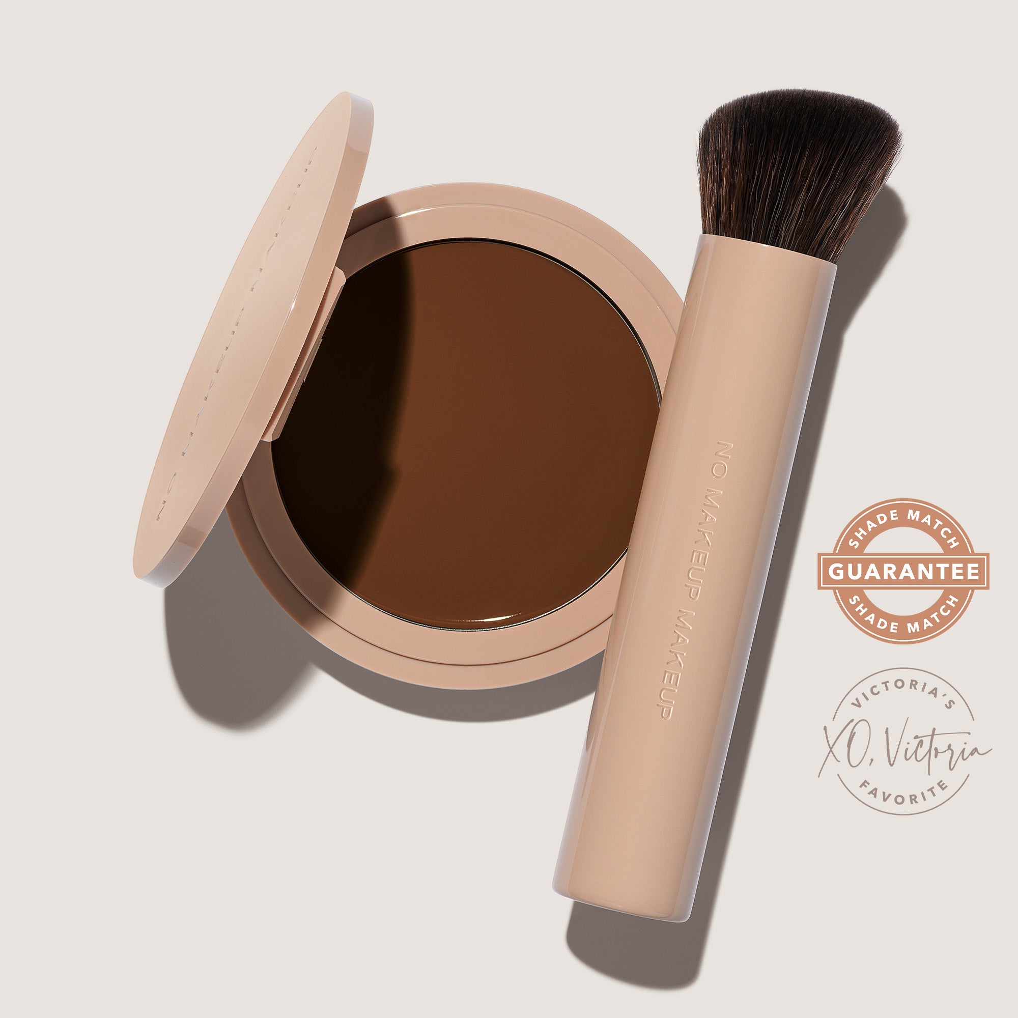 An open FlexShade Foundation by No Makeup Makeup compact in Deep and a brush with the Oprah Daily Beauty O-Wards 2024 seal