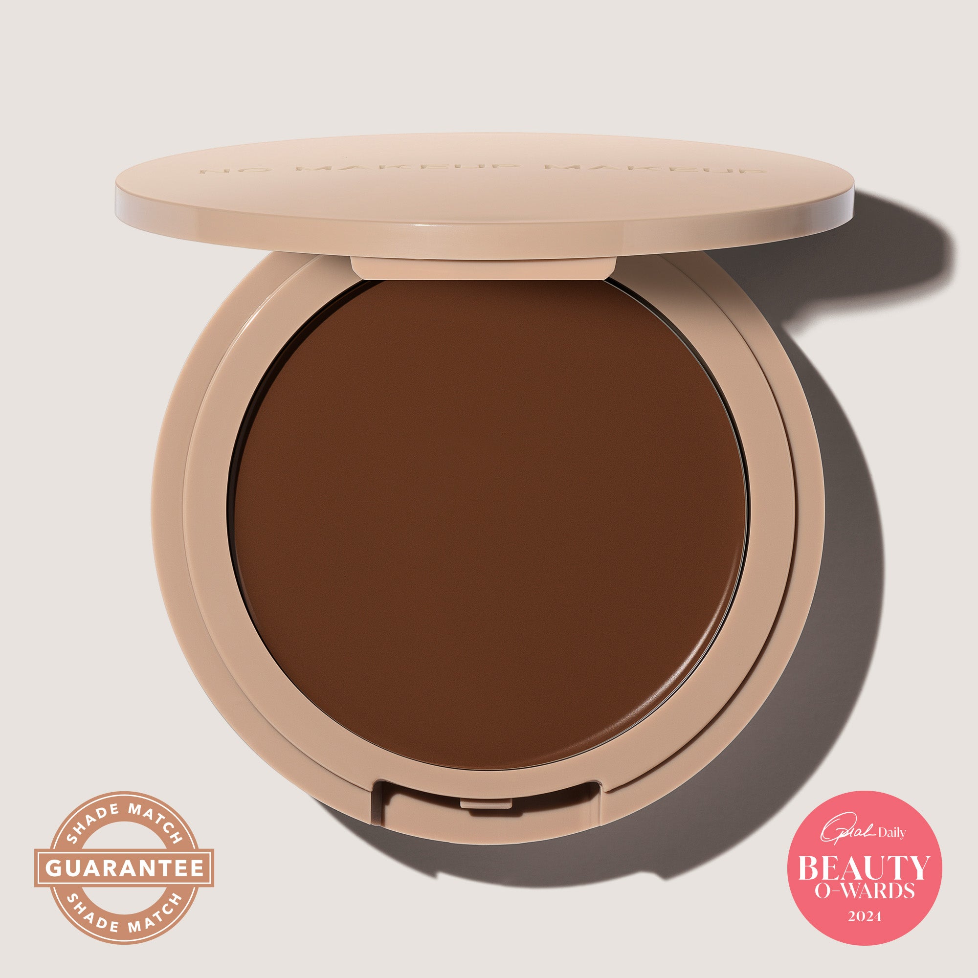 An open FlexShade Foundation by No Makeup Makeup compact in Deep with the Oprah Daily Beauty O-Wards 2024 seal