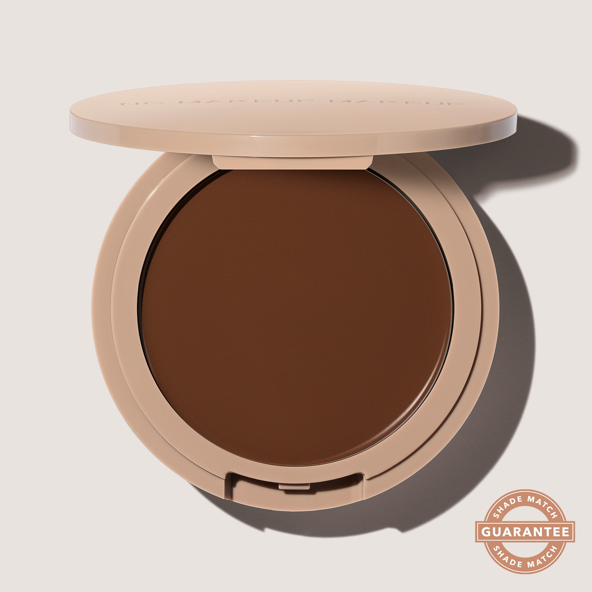 An open FlexShade Foundation by No Makeup Makeup compact in Deep with the Oprah Daily Beauty O-Wards 2024 seal