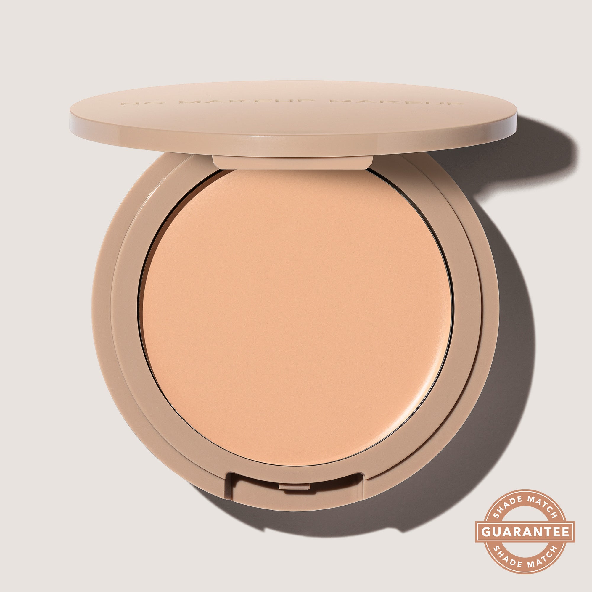 An open FlexShade Foundation by No Makeup Makeup compact in Fair