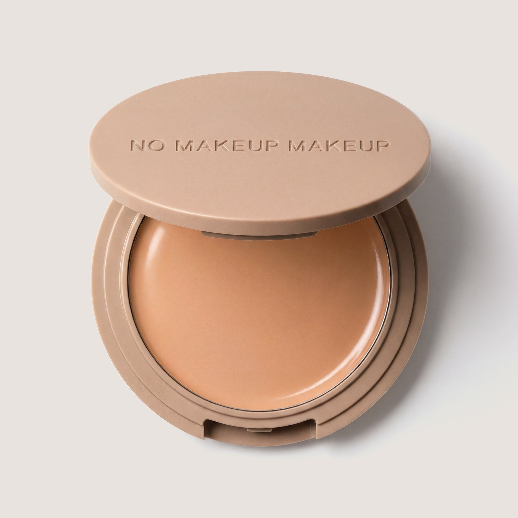 An open FlexShade Foundation by No Makeup Makeup compact in Light Medium with the Oprah Daily Beauty O-Wards 2024 seal