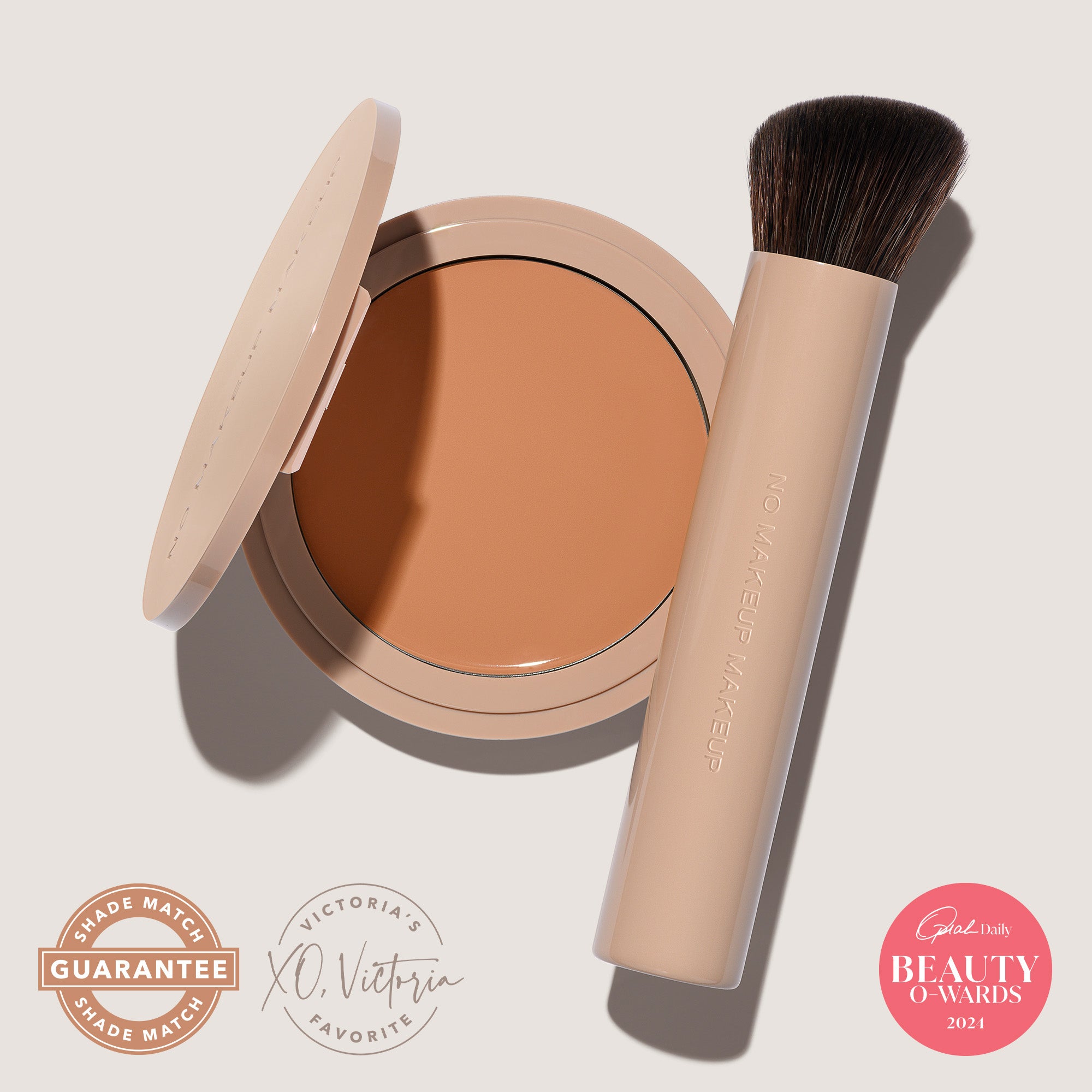 An open FlexShade Foundation by No Makeup Makeup compact in Medium and a brush with the Oprah Daily Beauty O-Wards 2024 seal