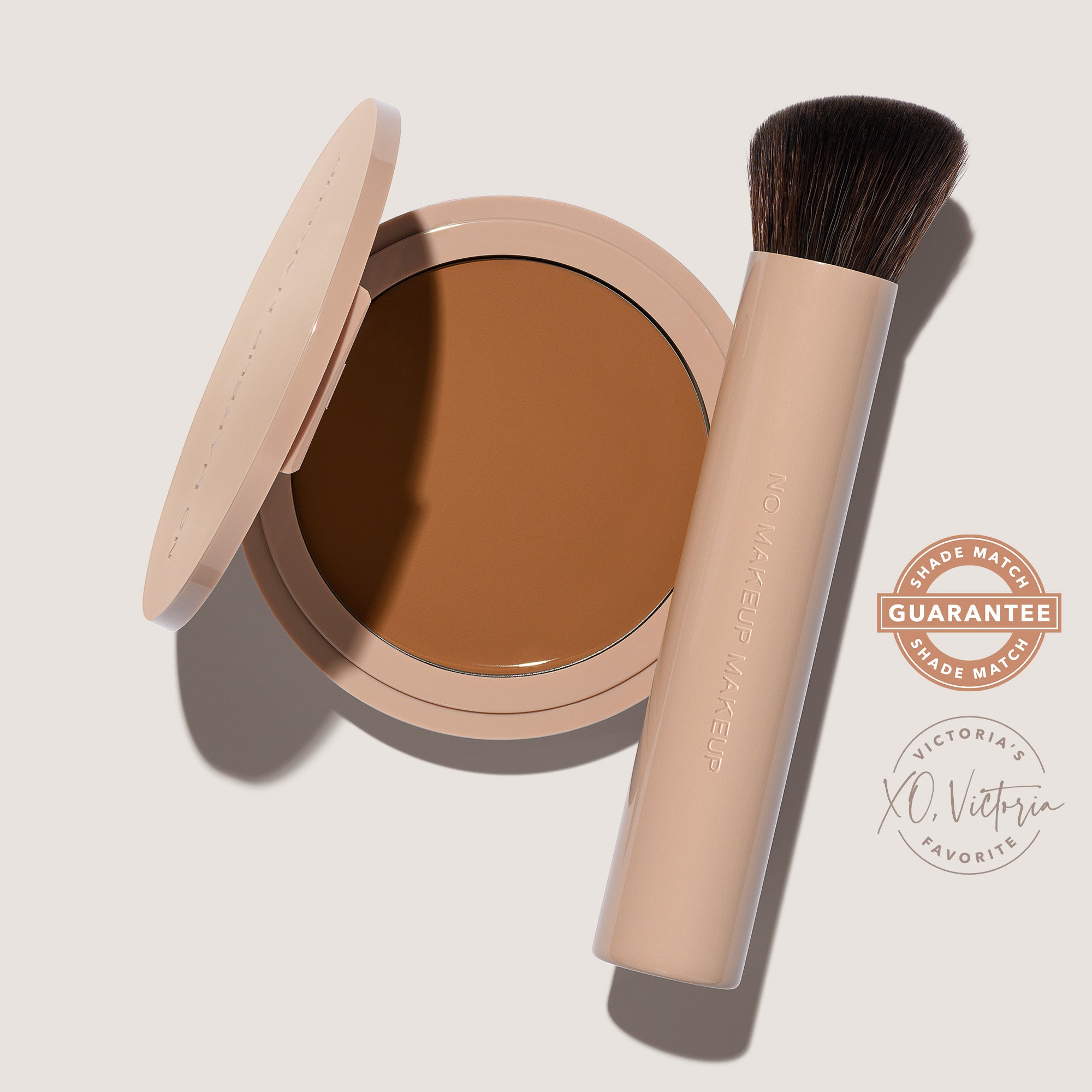 An open FlexShade Foundation by No Makeup Makeup compact in Mocha and a brush with the Oprah Daily Beauty O-Wards 2024 seal