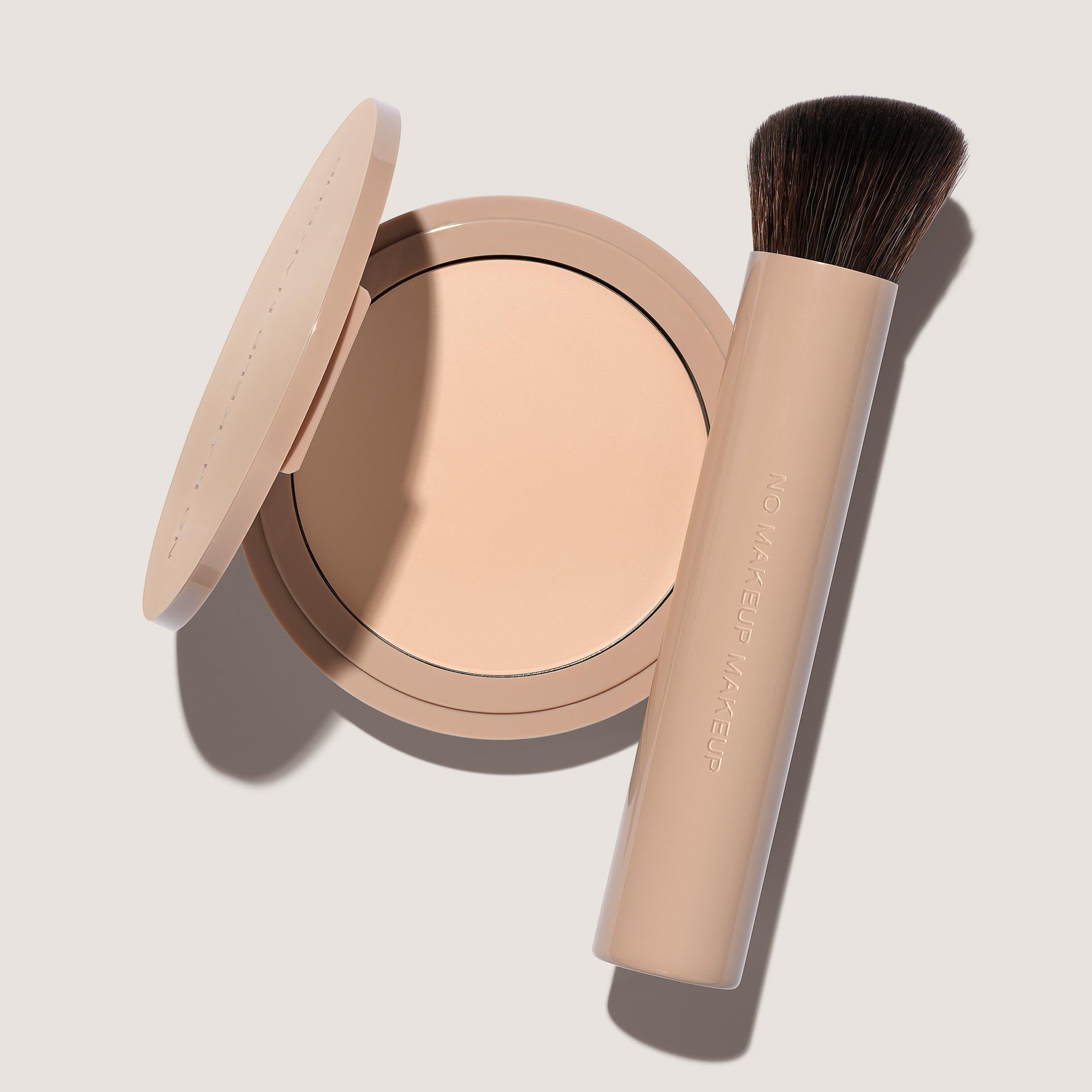 FlexShade Foundation by No Makeup Makeup compact in porcelain and brush, and Oprah Daily seal