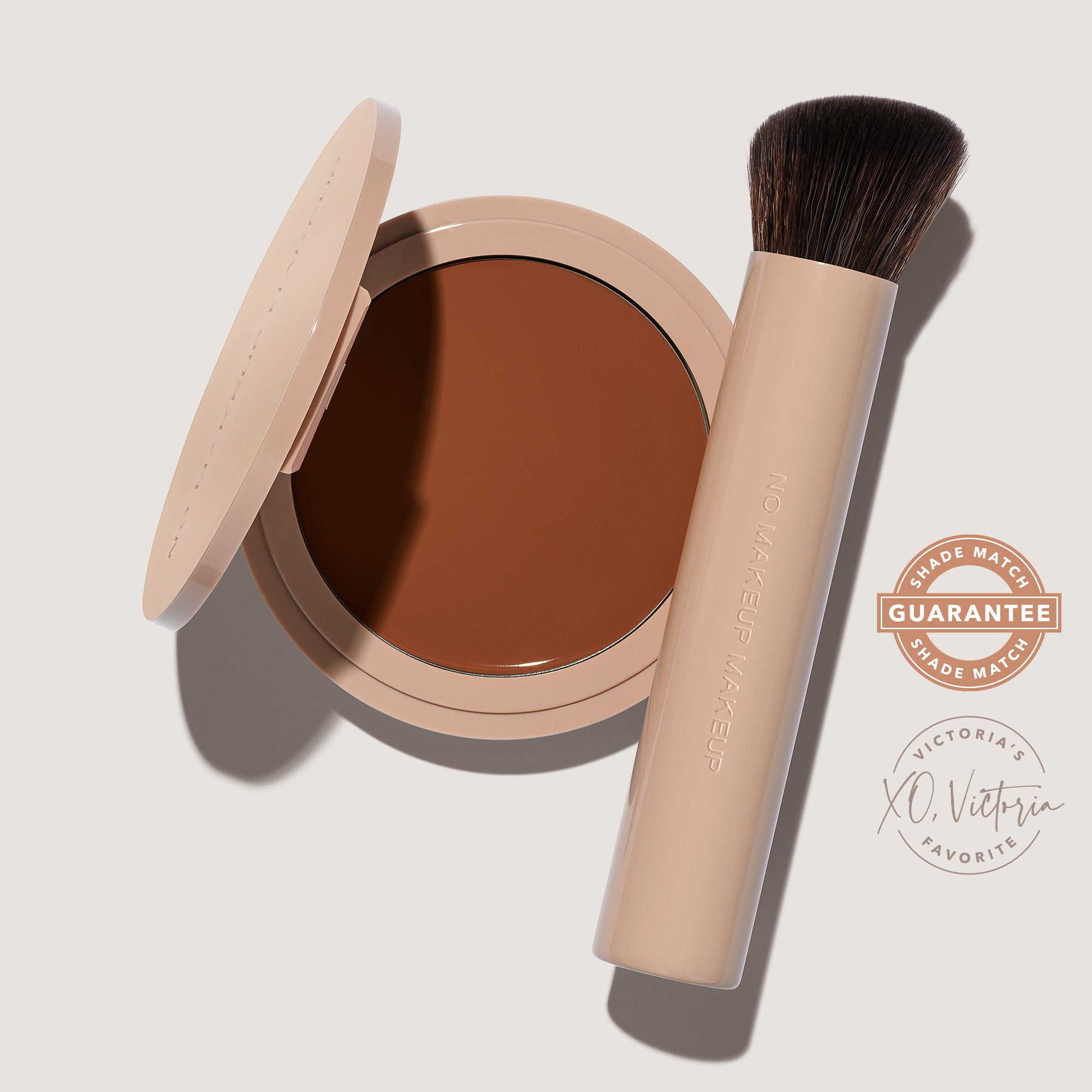 An open FlexShade Foundation by No Makeup Makeup compact in Warm Deep and a brush with the Oprah Daily Beauty O-Wards 2024 seal