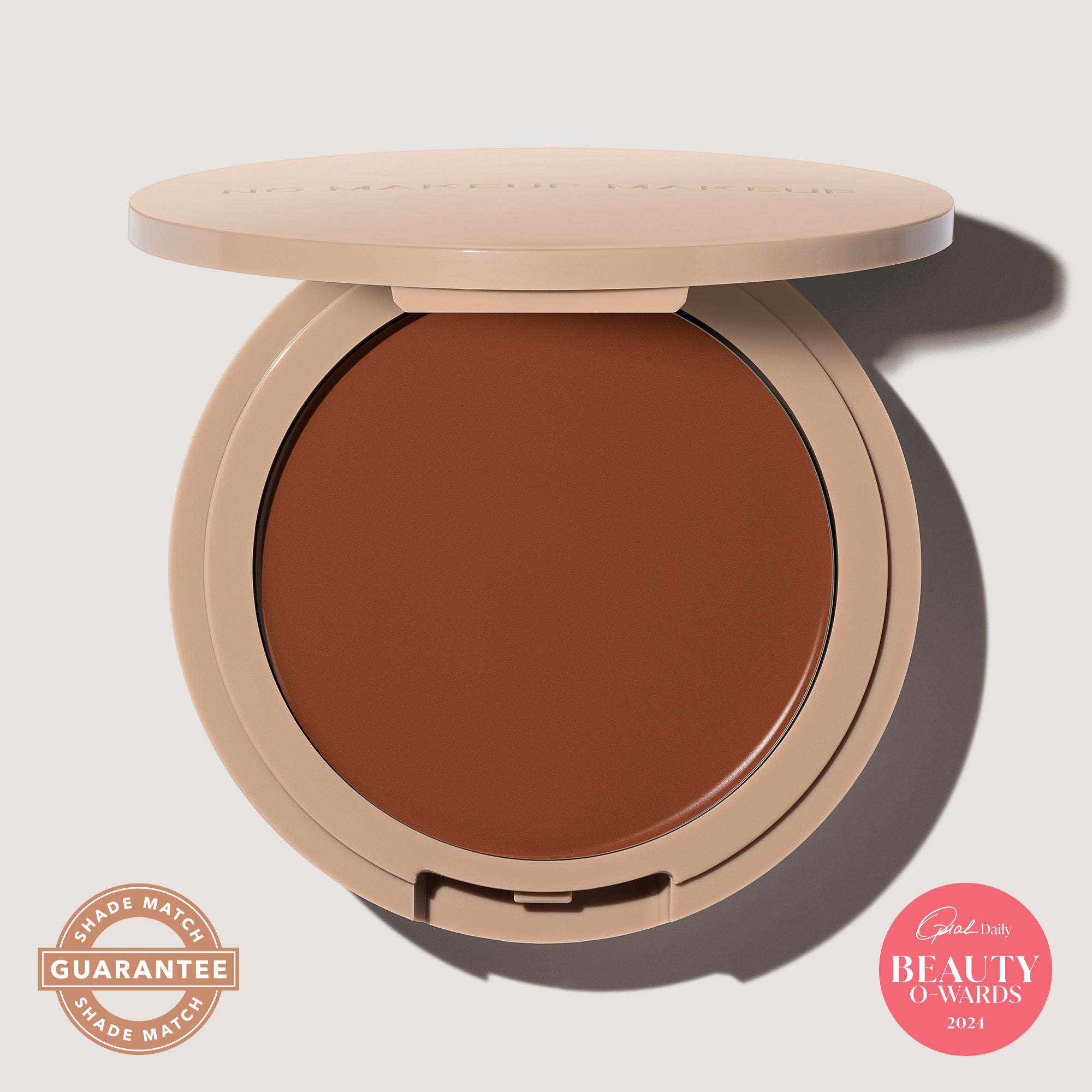 An open FlexShade Foundation by No Makeup Makeup compact in Warm Deep with the Oprah Daily Beauty O-Wards 2024 seal