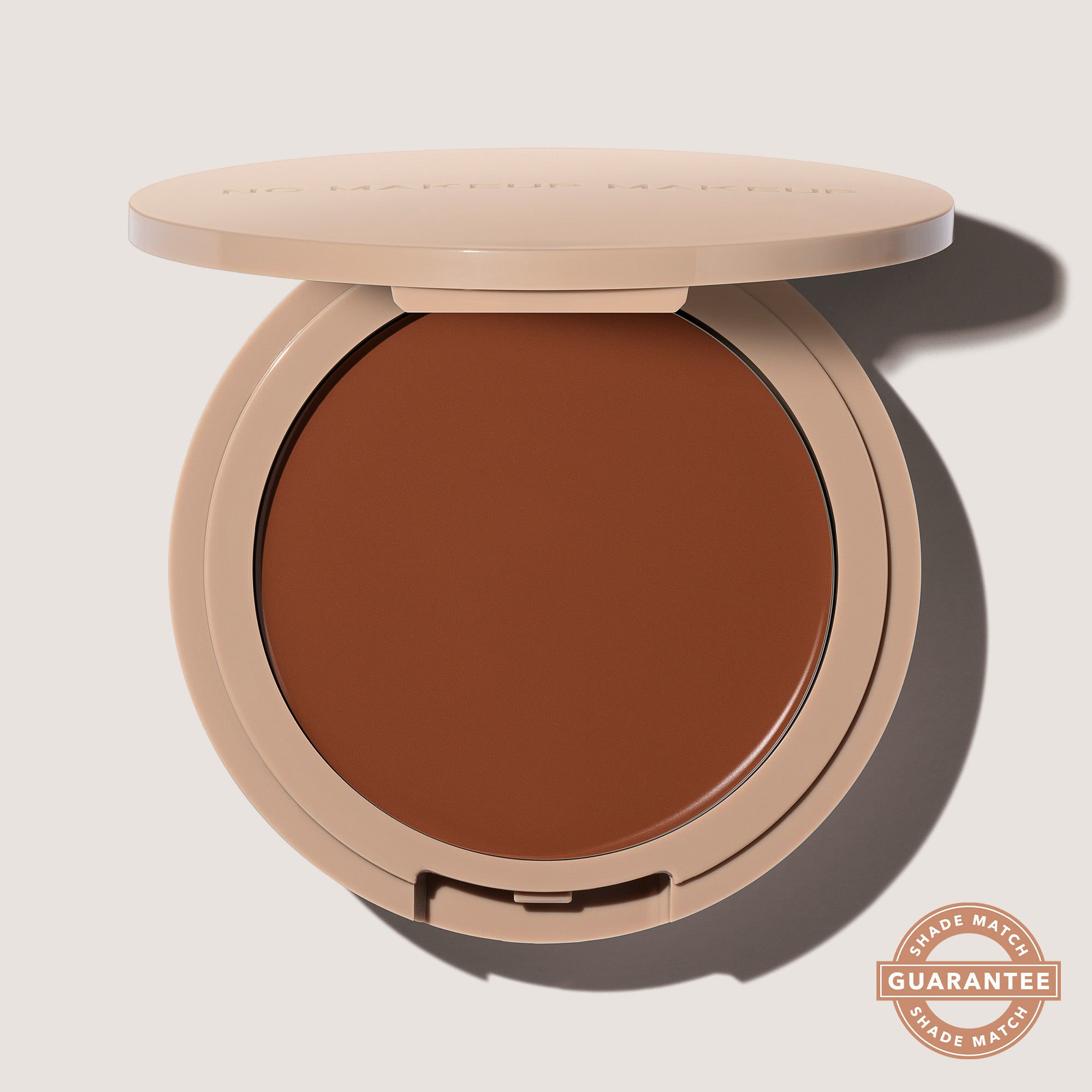 An open FlexShade Foundation by No Makeup Makeup compact in Warm Deep with the Oprah Daily Beauty O-Wards 2024 seal