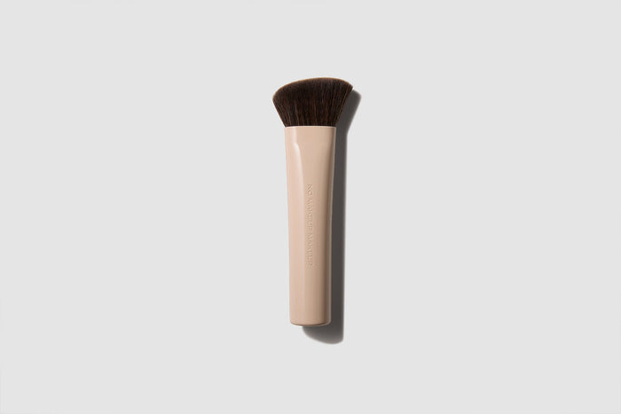 Professional shot of No Makeup Makeup® Blush Brush Tool against neutral background.