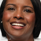 Dark skin woman wearing Blush & Lip Color in Plum