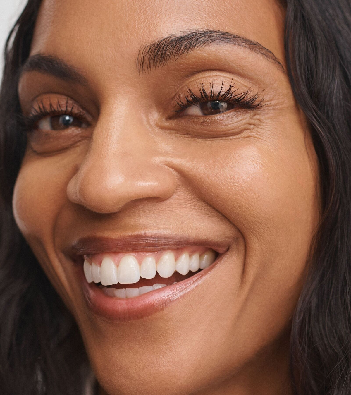 Dan'ee Tan skin woman wearing No Makeup Makeup Perfect Swipe Mascara in black
