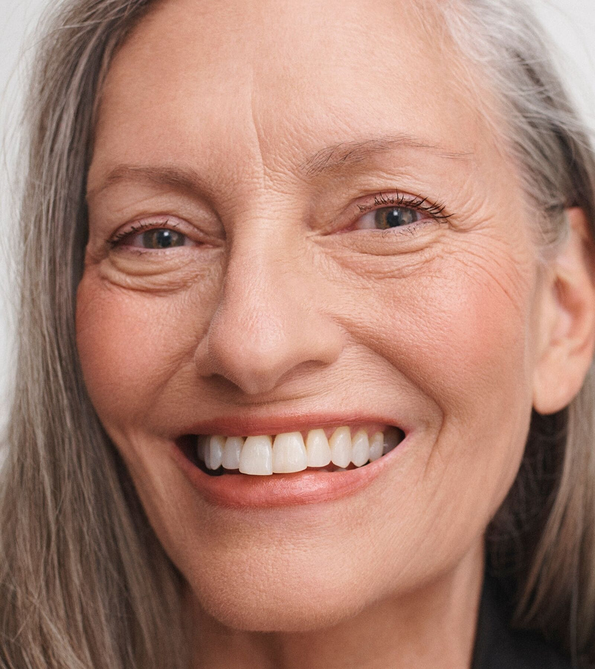 Erika Mature fair skin woman wearing No Makeup Makeup Perfect Swipe Mascara in black