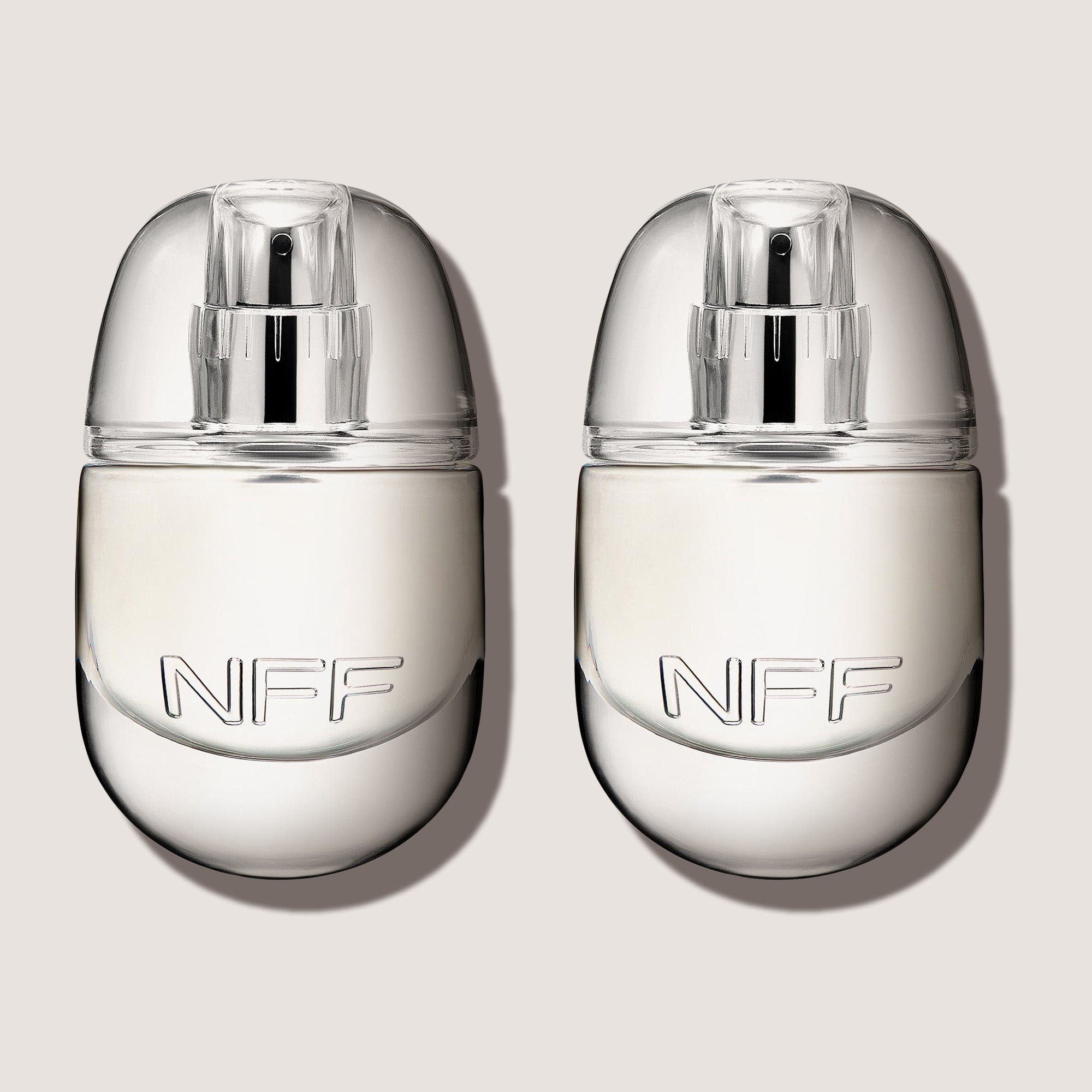 Two No Fragrance Fragrance perfume bottles on a light background
