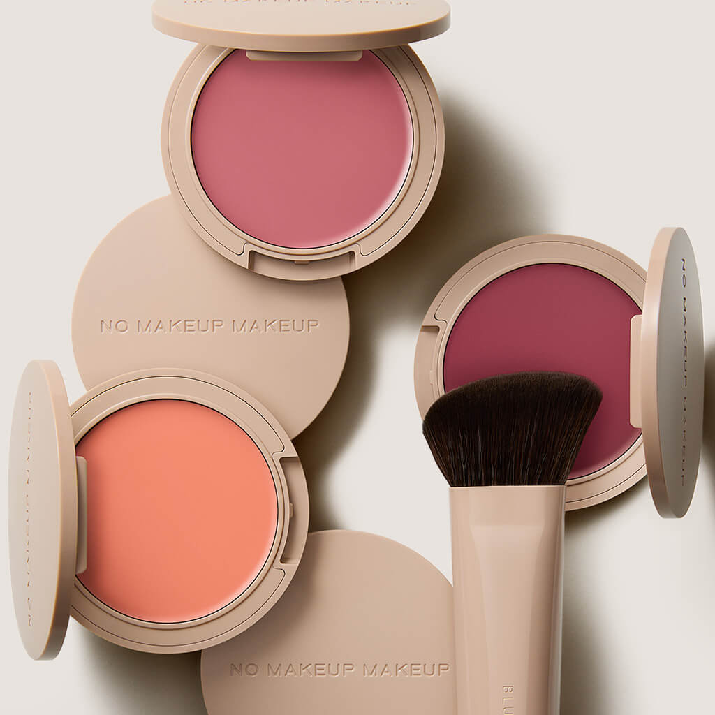 blush compacts and a brush